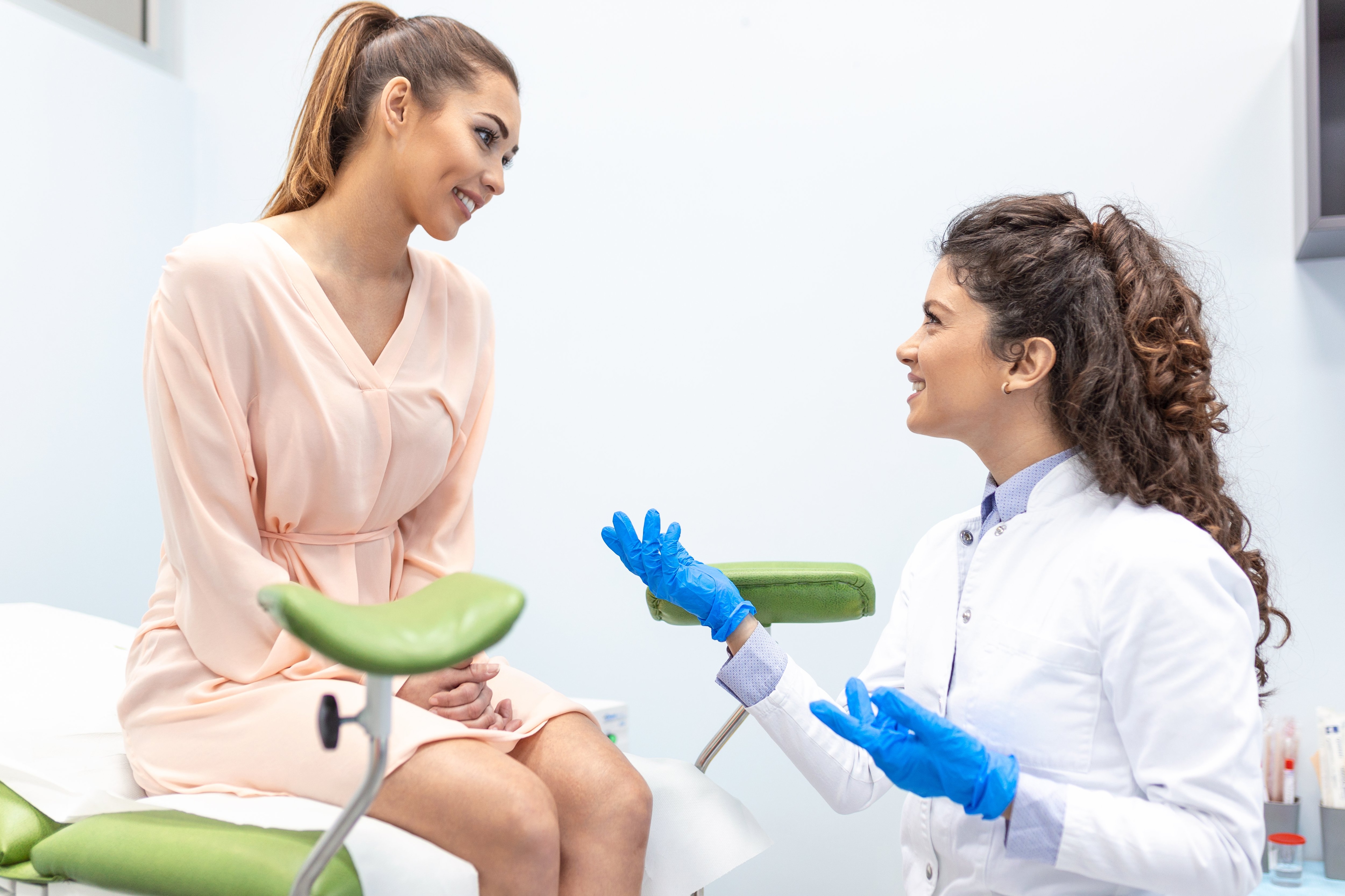 Woman talking to doctor